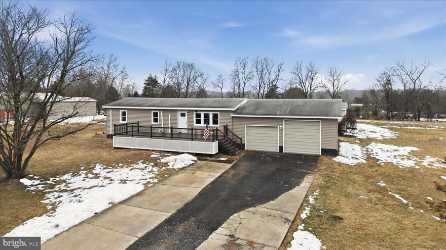 Single-level living with no HOA and a huge garage on a level 1.15-acre lot! This move-in ready rancher features consistent LVP flooring, an updated kitchen and baths, and a completely revamped exterior with new windows, insulation, sheathing, and siding (new roof will be installed before settlement). An inviting front porch and back deck add character and functionality to this 3-bed/2-bath home. The private primary suite features an en-suite bath, walk-in closet, separate office/sitting area, and access to the backyard. The secondary bathroom includes a walk-in tub, and there's also a separate laundry room with built-in storage for maximum efficiency within this compact footprint. In addition to the attached garage that offers plenty of space for vehicles, equipment, and other storage needs, the spacious lot affords tons of functionality with a separate shed and covered area for extra storage.  Situated in a peaceful community with proximity to Jefferson County amenities and surrounding areas, this single family residence offered at an affordable price point is the ideal place to call home!