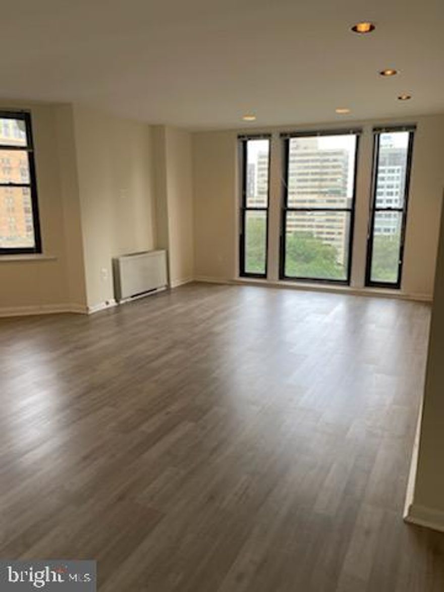 Deluxe one bedroom overlooking Rittenhouse Square at The Wellington! This spacious one bedroom features oversized bay windows in most rooms providing incredible natural light throughout. Enter through the foyer into a sun-drenched great room with ample space for separate dining and living areas. This room directly overlooks Rittenhouse Square thanks to large bay windows. Adjacent, there is a well-equipped neutral kitchen. The generously sized primary suite enjoys oversized windows, two large wall closets and a nearby full hall bathroom with designer white tiling, a glass enclosed stall shower and a single vanity. Additionally, the home has an in-unit washer/dryer and excellent storage space. The Wellington is a pre-war apartment building located on Rittenhouse Square offering a 24 hour doorman, on-site management, and access to a nearby fitness center at 1845 Walnut. Tenants are responsible for paying utilities.