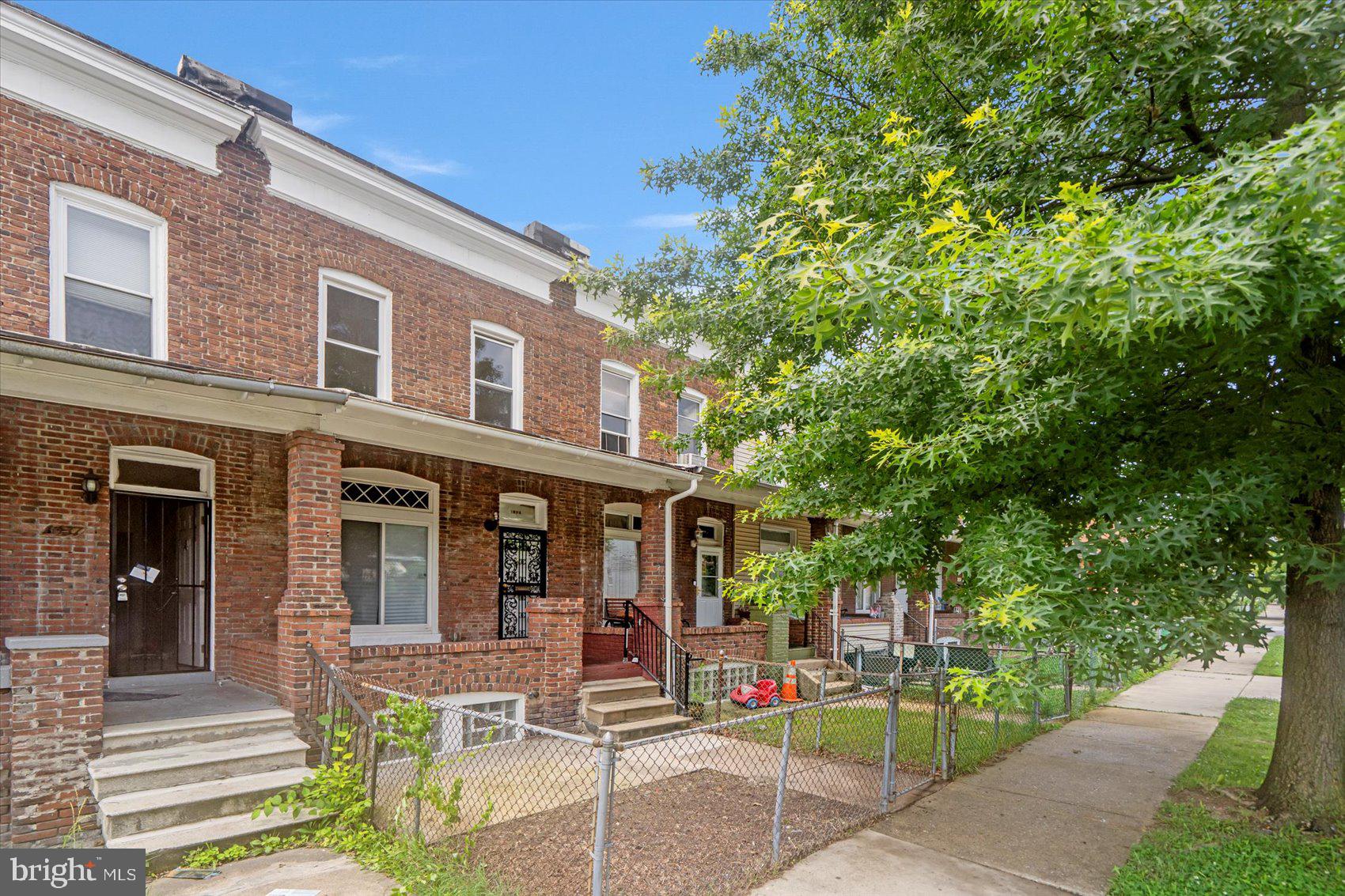 Recently remodeled 3BR/1.5BA brick Townhome on a lovely tree-lined street in Montebello. Make your way through the gated front yard to the covered front porch of your new home. Step inside to a home filled with natural light, easy care flooring, a soft color palette, recessed lighting, and an open floor plan. The main floor offers a large living room, spacious dining area, a half bath, and a beautiful kitchen. The kitchen offers plenty of cabinets, quartz countertops with a beautifully tiled backsplash, stainless steel appliances, and an island with breakfast seating for two or more. On the second floor are two sizable secondary bedrooms, a large primary bedroom, and a brand new full bath with a tiled walk-in shower. The lower level offers additional living space featuring a large family room, plenty of storage space, laundry, and a walk-out to the yard. From the kitchen step outside to a fenced yard with a large patio, adult trees, and so many possibilities. This home is move-in ready, ideal for any new homeowner, and is located in close proximity to shopping, restaurants, and commuter routes.