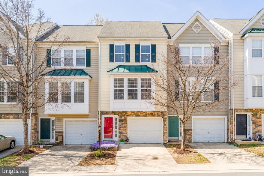 Super spacious 3-bedroom, 3-bath townhouse backing to peaceful green space, featuring two primary bedroom suites plus a large secondary bedroom with its own hall bath—ideal for flexible living arrangements. And yes… closets galore!

Location, Location, Location! Fontwell Square is situated in one of the most active data center hubs in the world—known for strong job growth and long-term investment potential. This beautifully maintained home showcases an attractive exterior with a bump-out that expands the main-level living area, creating even more functional space, along with the convenience of a garage plus driveway parking.

The main level features warm hardwood flooring, while the kitchen offers slate tile floors, a stylish tile backsplash, gas range, built-in microwave, dishwasher, and a new stainless steel refrigerator. With bar seating and additional table space, the kitchen is perfect for both everyday living and entertaining. Upstairs and downstairs feature neutral diamond-pattern carpeting for a clean, cohesive look, and a full-size washer and dryer add everyday convenience.

The upper-level primary suite impresses with a vaulted ceiling and private bath, while a second upper-level bedroom has easy access to a full hall bath with tub. The lower level—just off the garage—includes a third bedroom with its own full bath, effectively offering a second private suite. Step outside to enjoy a spacious deck overlooking tranquil green space, plus a walkout lower level leading to a fully fenced backyard—perfect for relaxing or entertaining.

Elevation exterior trim elements have been upgraded to low-maintenance cellular PVC for durability and easy upkeep. With generous room sizes, multiple private suites, outdoor living space, and thoughtful updates throughout, this home delivers the perfect blend of comfort, space, and functionality. See floor plans for your convenience—and reach out to schedule your showing, this one won’t last!