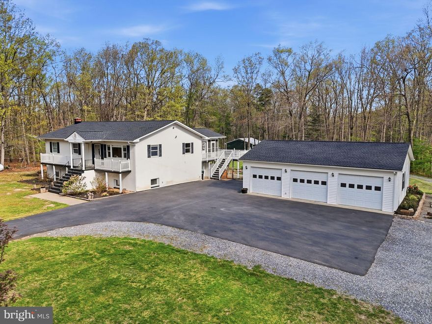 Set against the backdrop of the Shenandoah Valley in Elkton, this exceptional property offers the kind of space, flexibility and functionality that's becoming harder to find.
Situated on nearly 5 acres (4.9 to be exact), this 4-bedroom, 3-bath home delivers the perfect blend of comfortable living and practical versatility.  Inside, you'll find spacious bedrooms, a mostly finished  basement ideal for additional living or recreation space, and thoughtful updates throughout - including a new roof new HVAC and a updated appliances - giving peace of mind for years to come. 
Step outside and the opportunity  truly opens up.
The property features TWO separate 3-car detached garages, offering a rare total of six garage bays - a standout feature for the right buyer.  Whether you're a car enthusiast, collector or someone who simply values having room to store and protect your investments, this setup is hard to match. Looking for you own private home office? This one has that too!!   And if that isn't enough, there's also a generator to ensure your peace of mind. 
The nearly 5-acre lot offers room to breathe, while the fenced backyard creates a secure and welcoming space for pets or outdoor enjoyment.  And with convenient access to interstate 81, you're never far from where you need to be, while still enjoying the privacy and quiet of country living.
This is more than just a home-it's a property built for how you live, work and grow.