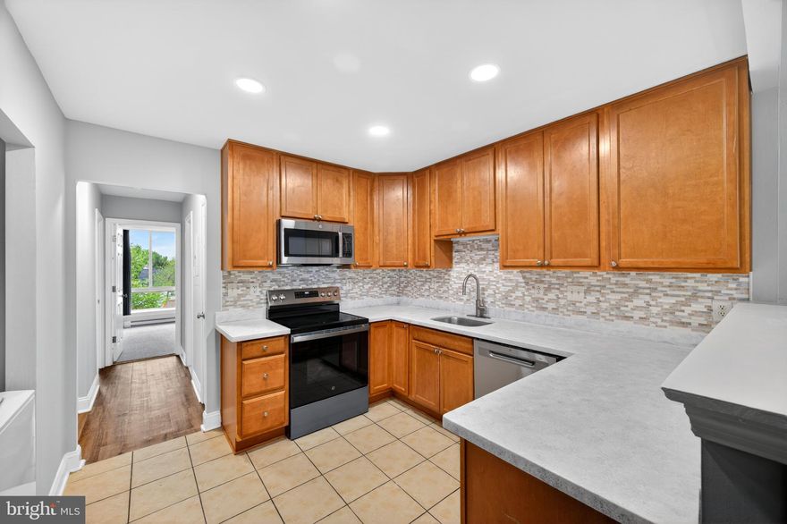 Welcome to 501 Prospect Blvd #A-32. This 2-bedroom unit is a 3rd floor condo at Jefferson Chase. Fully renovated in April 2026, this condo showcases thoughtful upgrades with a special focus on the kitchen and bathroom. LVP flooring, separate dining area, and laundry in unit. The refreshed kitchen features brand-new appliances, including a stove, dishwasher, and microwave, complemented by a decorative backsplash and new faucet. New LED energy efficient recessed lights throughout. The bathroom has been completely transformed with new tile flooring, a modern vanity, updated fixtures, a new toilet, and contemporary mirrors. Both bedrooms offer new carpet, ceiling fan and light combinations with remote controls, and closets featuring built-in organizers. Step outside to a covered patio illuminated by string lights, complete with recently professionally epoxied flooring.
This property is in a great location, a short way from the heart of Frederick and across from Frederick Shopping Center. The community has a 24 HR Fitness Room, outdoor pergola picnic area, grilling facilities and a playground! Secured building with controlled access and 24HR on-site maintenance and on-site storage. Easy access to I-270 and I-70 makes it convenient for commuting. Perfect for a first home, downsizing, or rental purposes. Additional upgrades: water heater 2026, all baseboard heaters 2026, mini split Unit (heat & cool) 2024, 2 AC wall units 2024, washer/dryer 2022. Call today for more information!