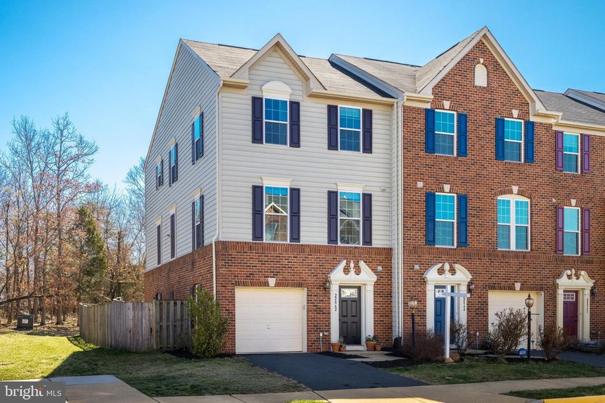 Welcome home to this bright and beautifully maintained 3-bedroom, 2.5-bath Strauss model in the sought-after Townes at Autumn Oaks community! This end-unit townhouse offers an open floor plan with tons of natural light, hardwood floors on the main level, and a beautiful kitchen featuring stainless steel appliances and granite countertops. The primary suite includes a private bath and ample closet space, while the lower level provides additional living space with a fenced-in patio and yard. Enjoy outdoor relaxation on the deck overlooking wooded views and the community playground. Additional highlights include a 1-car garage, easy access to the W&OD Trailhead just 0.3 miles away, and a prime location within 4 miles of Wegmans & Target and 6 miles from Dulles Airport. Don't miss this fantastic opportunity!