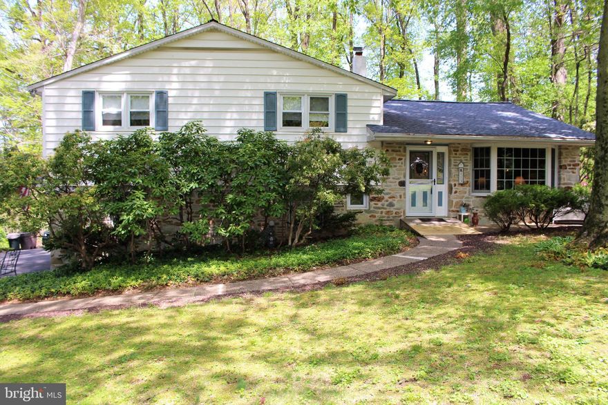 Stop the car!  YOU MUST SEE this SPACIOUS SPLIT!   It feels like paradise in this gorgeous Creekwood section of Southampton!  Peaceful and private!  This  4br 3.5 baths  includes 1000 sq ft additional living quarters!   Perfect for in-law suite, guest quarters, teenagers  or caring for loved one!     Includes comfy living room,  LARGE bedroom #4  and LARGE bath!    So many ways to use this BONUS living space to suite your lifestyle!   Luscious green grounds!  Just under an acre!     Gorgeous bow window welcomes the change of seasons!  Formal living and dining rooms celebrate today's desired open living space!   VERY  LARGE eat-in kitchen w/skylights and garden window!   Spacious family room w/wood burning insert.  Take the party outdoors from the large screened in porch to the large trex deck!   Maintenance free!  Spacious MBR with his and her closets!  Remodeled master bath!  LARGE  bedrooms #2 and #3 with great closet space!  HARDWOOD FLOORS throughout most of the home under carpets!   Finished basement.  1 1/2 car garage.  Plenty of storage for bikes, tools!   Roof brand new in 2014.  Central Air.  Natural GAS heat and hot water!  Move in condition!   ONE YEAR HOME WARRANTY includes heat and air coverage!  So much house for the money!   Award winning Neshaminy School District!   Absolute must see!