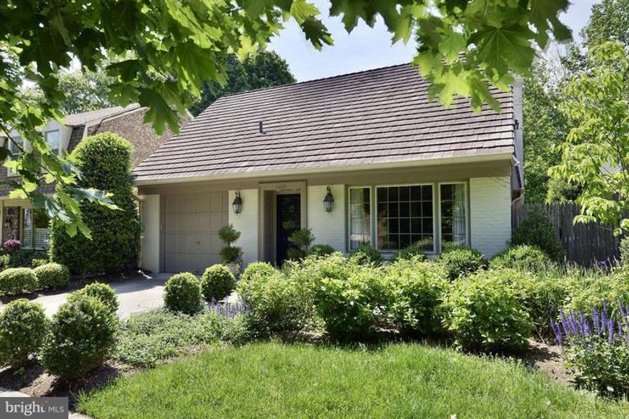 Wonderful totally renovated home in desirable Overlook, with easy access to neighborhood pool, Capital Crescent Trail and the tennis courts, ball fields and playgrounds of Westmoreland Park.  Gourmet kitchen open to dining room, and spacious living room all opening onto terrace and garden overlooking parkland. First floor library could be bedroom, lower level finished suite.