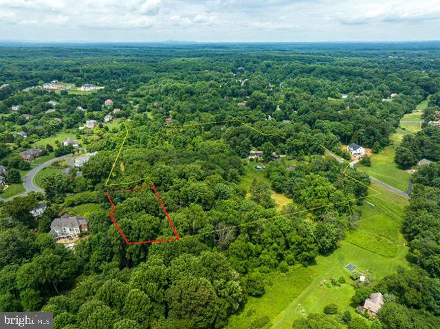 Nestled in the serene landscape of Great Falls, this exceptional 1.05-acre lot offers an unparalleled opportunity for your dream home. Situated adjacent to a sprawling 14-acre with a conservation easement, tranquility and privacy are assured, with no future development to disrupt the natural beauty. Tucked away on a charming street near the heart of Great Falls, this parcel boasts a prime location while still maintaining a sense of seclusion. The convenient gas and electric hookups are ready for you to start building while water is just in the cul-de-sac. Moreover, the lot percs for 6 bedrooms, providing ample space for a spacious and comfortable residence. The owner has thoughtfully prepared plans for a custom 6-bedroom home, offering the perfect blueprint for your vision. Whether you envision a secluded retreat or a lavish estate, this lot presents an unparalleled canvas to bring your aspirations to life. Don't miss this rare opportunity where tranquility and luxury converge in perfect harmony.
