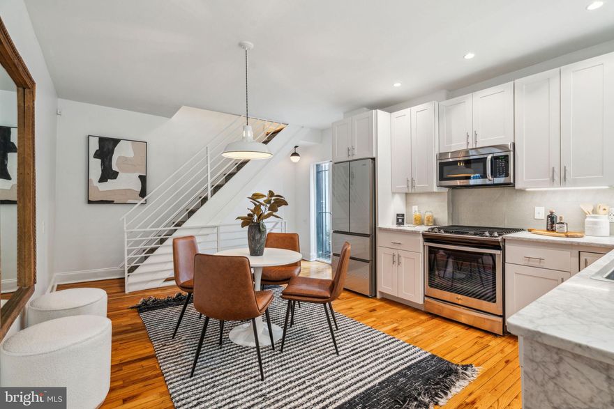 Welcome to 607 S. 20th St in the heart of the Graduate Hospital neighborhood. This charming property is situated on a 20ft wide lot, allowing for three sides of window exposures for extra light. With high ceilings, hardwood flooring & natural light throughout, this gem is surrounded by some of the best neighborhood restaurants, eateries, and retail (Pub & Kitchen, Sabrinas, Ten Stone, City Fitness, Rittenhouse Hardware & more!). The first floor is an open kitchen with marble counters, upgraded appliances, and a glass door to a private terrace with gated access directly to 20th Street (great for bike access!). The 2nd level features the 2nd bedroom, laundry room, and hall bathroom with a seamless glass shower and single vanity sink. The 3rd-floor primary bedroom is spacious and is highlighted by its lofted ceilings and natural light, with additional space for a home office or reading nook. The finished lower level has many uses as an extra living space (family room, home office, gym, studio). The front windows were all recently replaced with energy-efficient Anderson windows. This upgraded home is an excellent alternative to renting in a premiere Philly location with easy access to Penn, HUP, CHOP, Drexel & 30th Street Station.