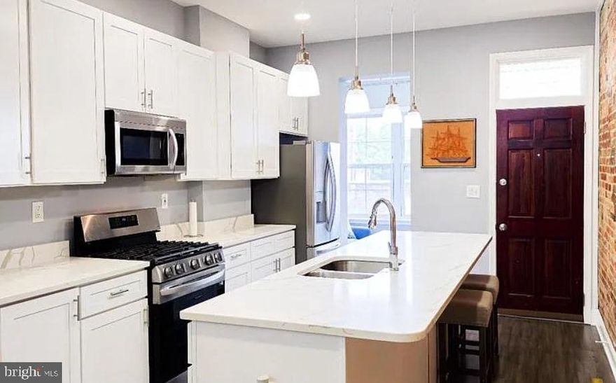 Your Big Happiness Awaits in Charles Village!

This lovely townhouse underwent a comprehensive renovation between 2022 and 2023, meaning you can enjoy a fresh, modern feel with minimal upkeep.

//Two HVAC systems//
A hot water heater//
Roof//
Gorgeous white cabinets//
sleek stainless-steel appliances//
elegant quartz countertops//
beautifully updated bathrooms//
Stunning LVT floors//
cozy electric fireplace//
modern recessed lighting//
A balcony//
Clean basement space for convenient laundry and storage//
Fenced back-yard, the perfect spot for entertaining friends and family//
Local parking permit for parking just in front of the house (New owner should apply for it)//

Imagine the ease of city living in this beautiful 4-bedroom, 2.5-bathroom townhouse nestled in the heart of vibrant Charles Village. 

Easy Parking! You can park just in front of the townhouse; it's residents only parking area. 

- Just 11 mins stroll from the Johns Hopkins University (JHU) main campus.

- 30 seconds to JHU shuttle stop, and city bus stops practically at your doorstep, convenience is truly key. 

- Plus, you'll find yourself in close proximity to Baltimore Penn Station, grocery stores, and bustling business areas – everything you need is within easy reach!

Step inside and discover a home that blends modern style with comfortable living. 

The top floor unveils a luxurious Master Suite, your personal sanctuary completes with a spa-like en suite full bath featuring a relaxing soaking tub and separate shower. 

Picture yourself unwinding after a fulfilling day with a warm bath and serene city views. 

A double vanity ensures smooth mornings, even during the busiest of times.

Don't miss this incredible opportunity to embrace a vibrant lifestyle in a meticulously updated townhouse. 

Come and experience your big happiness in Charles Village!

Tenant is responsible for all the utilities.
Lease term is 6 - 12 months.
Security deposit is the equal amount of the first full month rent.