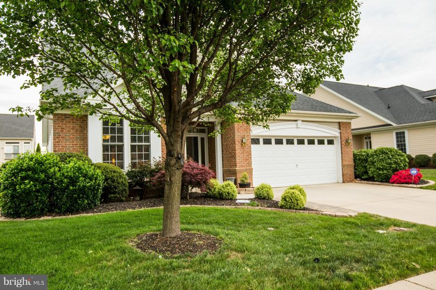 Main level living was never so perfect! Beautiful no-basement home has fabulous upgrades, gorgeous architectural features plus gleaming hardwoods on main and loft levels. Upgrades include glass shower doors, large walk-in attic storage, molding, builtins,stained glass accents,tinted windows, irrigation, recent top quality appliances (not fridge), brick patio, gas fireplace & more! See it Soon!