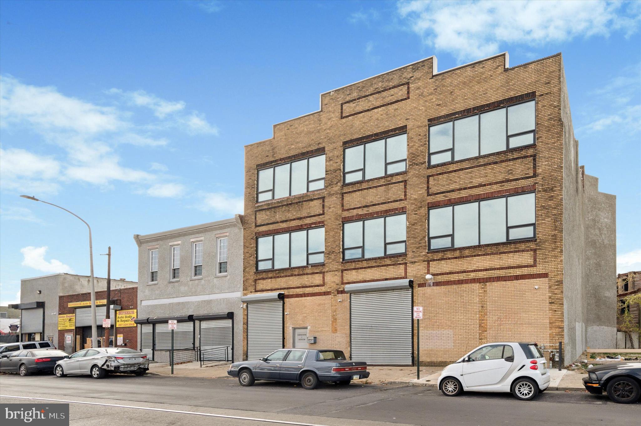 Business Owner / Developer / Investor Alert!! Pontential for up to 13 residential units + commercial on the first floor - plans attached. Incredibly rare opportunity to purchase this 3 story, 15,000 + sq.ft property zoned CMX2 directly on Germantown Avenue. Configure the layout to meet all your business needs. The first floor has a 13' ceiling height, second floor has 12' and 3rd floor has 15-20 feet (A Frame) so the ceiling gets higher as you move inward, and is 15' at its lowest point. With these soaring ceiling heights, large space and central location, the potential here is truly endless. This building has so much to offer for every type of investor and/or business owners. A remote controlled drive-in 11' high rolling gate makes for ease of delivery and parking. The property has separate entrances to the first floor and the top 2 floors, making individual renting of the top floors or bottom floor individually, simple. The single door provides access to the ground level while the double doors provide access to the second and third floors. There are additional stairs at the rear of the building that serve as another access to the upstairs and rear egress. This space would suit many different businesses including medical / professional offices, warehousing, charter school, professional workspace or convert the upper levels to apartments (plans available), Clean environmental phase 1 and Phase 2 available upon request.
Schedule your showing today to envision all the possibilities of this truly remarkable building. Buyer due diligence to confirm all potential uses . Elevator currently non functioning. Property also available for lease.
