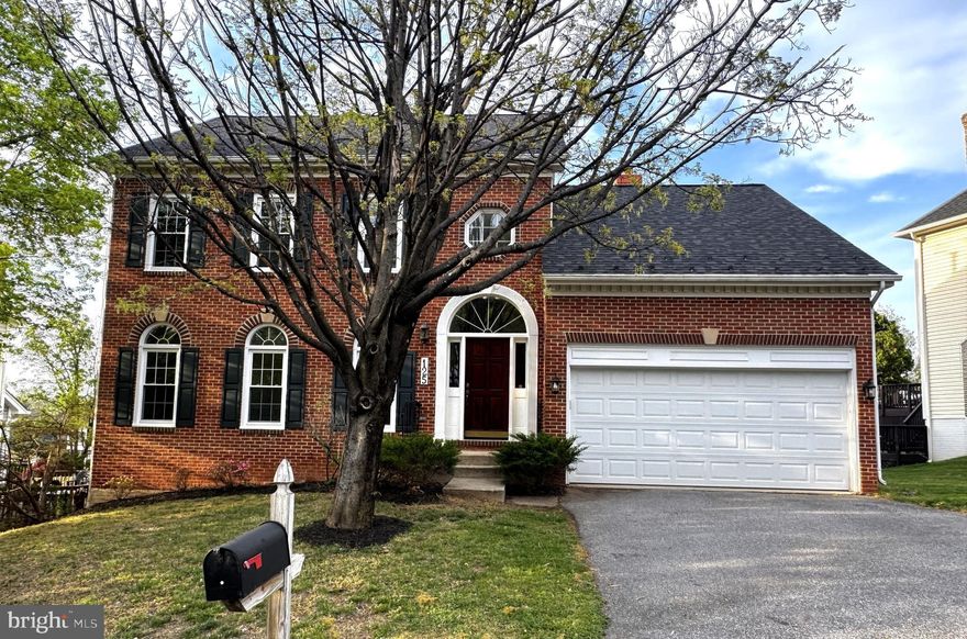 Beautiful brick-front colonial single family house for sale in great condition!  5 bedrooms and 3.5 baths with walk-out  basement, very convenient location but very quiet community.   2-story foyer, hardwood floors on main level, 9 + ceiling, custom columns and intensive moldings, recessed lights,  formal living and dinning room, bay window and chair/crown  moldings in dinning room,  family room with wood-burning fireplace,  island kitchen with granite countertops,  breakfast table space, powder room on main level.  Upper floors 4 big bedrooms 2 full baths with engineer wood floors,  master bedroom suite with separate tub and shower, Jacuzzi tub, walk-in closet.   Fully finished walkout basement with a bedroom, full bathroom, a study room and recreation room, engineer wood floors,  with door to backyard.   Deck tucked under beautiful cherry tree.   Roof 4 years windows 3 years.   Close to Giant,  Crown/Rio/Kentlands shipping centers, I-270, Shady Grove Metro and more.  OPEN HOUSE SUNDAY 4/19 1-4PM
