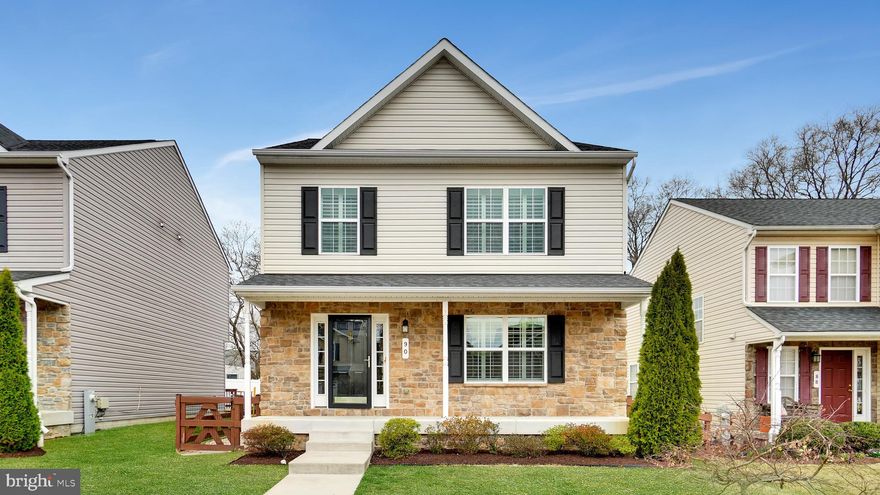 This charming colonial home welcomes you with gleaming hardwood floors and abundant natural light. The main level features a powder room, a spacious family room, a dining area, and a beautifully appointed kitchen with stainless steel appliances and granite countertops. Step outside to enjoy the maintenance-free deck with a retractable awning, overlooking a fenced-in yard with a generously sized shed.

Upstairs, you'll find three spacious bedrooms, two full bathrooms, and a convenient laundry area. The lower level offers even more living space with an additional family room, a versatile hobby room, ample storage, and an areaway leading to the backyard. This home blends comfort and functionality, making it a perfect place to call home!