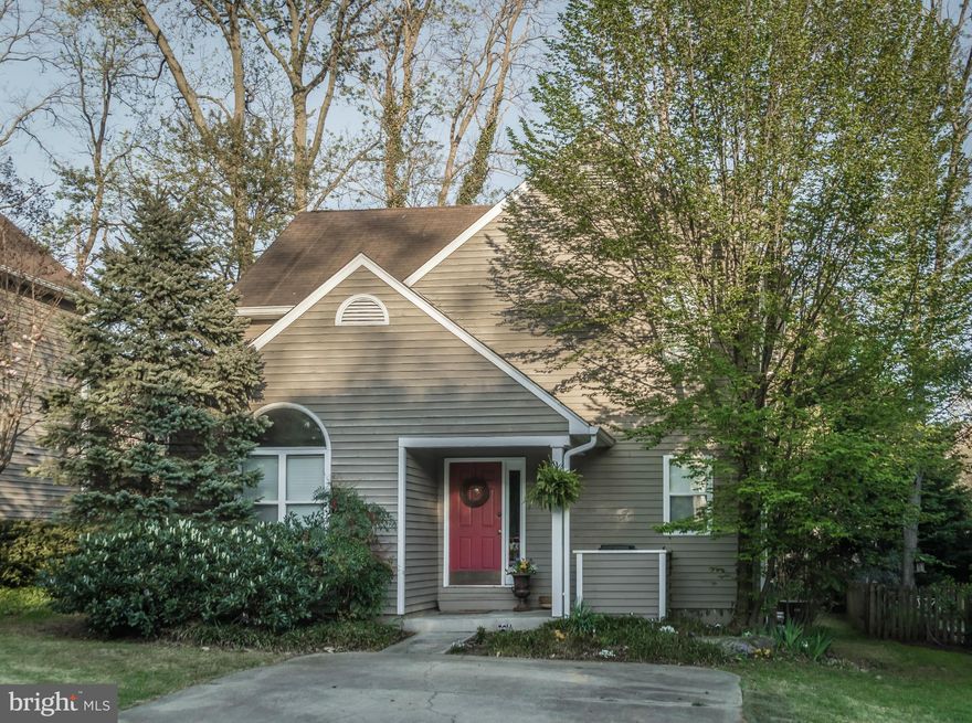 Adorable home in sought-after community of Southwoods. This 3BR, 2.5BA home has 3 finished levels. Features incl. large, eat-in kitchen, light-filled open floor plan, beautiful hardwoods, fireplace, updated baths. Finished basement. Screened porch and back deck great for entertaining in wooded setting. Community tot-lot, convenient location w/ quick access to downtown, Rt. 50, Annapolis shopping.