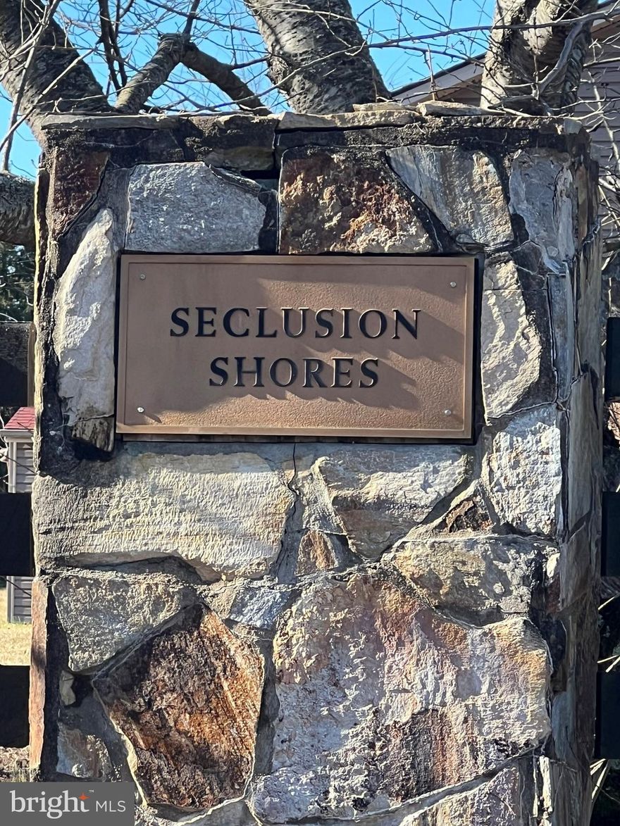 Beautiful, private lot with its own pond on the private side of Lake Anna. The lot is perked, the driveway is installed and the site plan is on hand. A short golf cart ride to the common area.