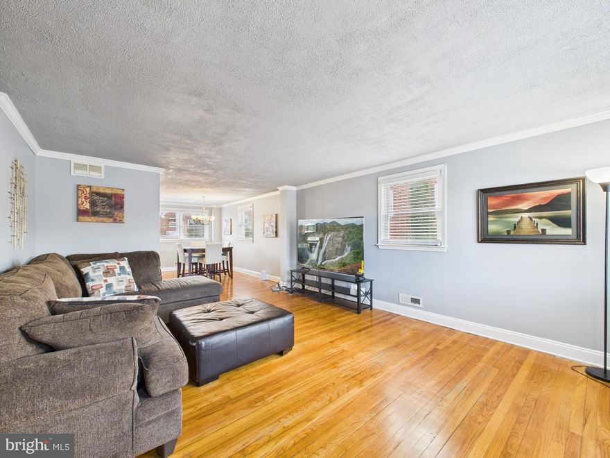 Motivated seller! Welcome to 1551 Langford Rd—an end-of-group townhome tucked just outside Catonsville, offering great square footage, off-street parking, and the kind of charm you don’t have to “imagine.” Step onto the inviting front porch, perfect for summer mornings or crisp fall evenings, then head inside to beautiful wood floors and a bright living/dining setup accented by crown molding.

The tastefully updated kitchen features granite countertops and stainless steel appliances, plus easy access to a rear porch right off the kitchen—ideal for grilling, coffee, or a quick breath of fresh air. Upstairs you’ll find three spacious bedrooms with wood flooring, and two fully updated full baths that feel clean and modern.

Downstairs, enjoy a fully finished lower level with a full bath, laundry area, and a lower-level bump-out that gives you flexible space for a rec room, home office, gym, or guest setup. Conveniently located near shopping, dining, parks, and commuter routes—this one checks the boxes. Schedule your appointment today!