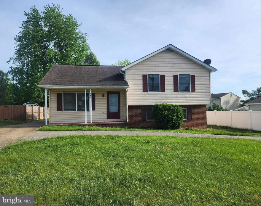 5-bedroom, 3 full bath split level home in Patrick Henry Estates. The basement is an apartment that has a private entrance in the rear. It has its own kitchen, living room and bathroom. 2-bedroom potential on the lower level or keep one for storage.  Utilities are shared in the house. Apt is served by electric BB heat while the upper house has electric BB and HVAC with AC.  The main house is very roomy with the living room as your entry with the kitchen / dining area that is centered on the main floor with a roomy family room addition behind that. From the living room, take a few steps up to 3 bedrooms with a full hall bath and linen closet and a full master bath. The appliances remain for both kitchens, refrigerator electric stoves and a shared stackable washer dryer in the apt. 
Please note this property is being sold AS IS. Purchase of the property will be cash at the closing or on terms acceptable to the seller.