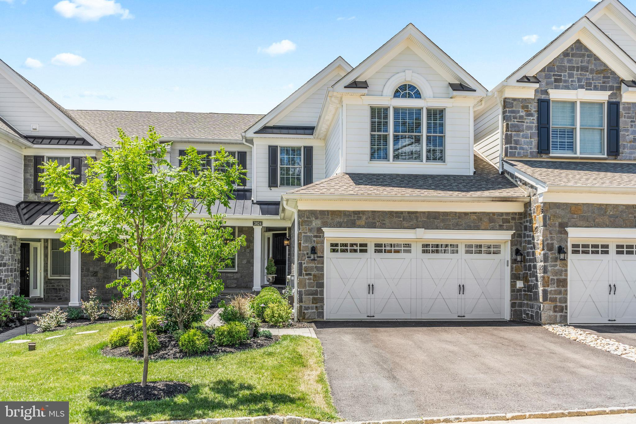 Mid unit townhome with 4 bedrooms and 3/1 bathrooms, located in the Devon collection section  One of the best lots in the community with fabulous open space to the rear, looking out over a nature reserve. The owner payed a $60K lot premium for this view! Why wait for New Construction- its all ready and waiting for you here, and less than 2 years old! Enter through the front door with welcoming front veranda to the elegant entry way and  spacious dining room. 10' ceilings throughout the first floor and 9" on the second. Neutral decor throughout! The powder room canalso be found at this level, along with access to the 2 car garage. The kitchen is magnificent, with pale grey cabinets, attractive  hexagonal  tiled backsplash, and granite counters. The island is very large with seating for up to 4 people. The 48" cabinetry is complimented by stainless steel Jenn Air appliances, including a range cook top with hood and external vent, dishwasher, refrigerator, microwave  oven combo and single wall oven. Three attractive pendant lights illuminate the island. The family room has a gas feature fireplace and a wall of windows  covered with Hunter Douglas silhouette shades with remote control, and a cool contemporary ceiling fan. A slider to the deck, accesses outstanding uninterrupted  views. The composite deck spans the entire width of the house with privacy fencing and an attractive pergola for shade. Perfect for entertaining and watching amazing sunsets! The master bedroom suite, on the first floor has a large window looking out to the rear, and the same window shades as the family room. There's his and hers custom fitted "walk in" closets and a lovely grey and white master bathroom, featuring  a double wide shower cubicle with seat,  double sinks and a vanity area, linen closet and separate WC. The convenient laundry room can be accessed from the entrance hall as well as from the master bathroom. Upstairs are 3 more bedrooms, one with his and hers "walk in" closets, all fitted with custom closets too, and a hall bath with soaking tub and linen closet. An open area overlooks the floor below from behind a decorative iron railing  stair case, and landing. The finished walkout basement is very large with additional closet space and a full bath with enlarged shower cubicle. There are two daylight areas separated by a dividing wall. Liseter community has many open spaces, walking trails. a clubhouse, fitness center, tennis courts and an outdoor pool. Its a lifestyle that you'll love, where everything is taken care of, for you to sit back and enjoy with friends and family. Convenient access to major commuter routes, the popular shopping and dining  at Newtown Square, Wayne,  Media,  and just 25 minutes to Philadelphia International airport.