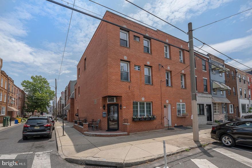 Introducing this remarkable home situated on a beautiful southeast facing corner in the heart of Passyunk Square! 1167 S 11th St. has an abundance of beautiful natural light plus curb appeal that immediately greets you at every turn, this property is 17 ft. wide and is over 2600 square foot property is zoned CMX1 but the current use is residential . You will enjoy the lovely outdoor front sitting area it possesses and the amazing real brick 3-story façade.  As you enter you are immediately greeted to a grand living area that includes beautiful custom hardwood floors, high ceilings, recess lighting, handcrafted staircase and custom wood moldings.  This area flows freely into an office/den area perfect space for working from home and includes a convenient renovated half bath.  Next comes an amazing open air Chef's kitchen that is made for the foodie in you, it includes a spacious island for prepping, all high end granite countertops, Italian custom ceramic tumble backsplash and custom tile floors, Stainless steel appliances, and a separate dining area that is so inviting and waiting for major entertaining. The rear of the kitchen has a separate side entrance for more beautiful light and a gigantic back pantry for storage. The 2nd level includes 2 bedrooms with sleek hardwood floors, the Primary bedroom has its own primary spa bath with a deep soak tub, separate shower, granite storage vanity and custom tile finishes and fixtures. off the bathroom is a separate and convenient laundry area with a full washer and dryer, this room spills out to another outside area a great roof top access side deck that the new owner can make their own.  3rd level has 2 very spacious bedrooms and another private full bath in the front bedroom for privacy finished with hexagon tile and ceramic finishes, hall 2nd bath is a finished full bath as well !  Wait there is more! Full finished basement is gigantic newly painted and finished with wainscoting and has major storage space, this is the Woman/Mancave or your children's recreation space you crave for, the basement has all updated mechanicals, this home is built to last.  Located in the awesome Coppin Jackson school district you can walk or bike anywhere especially with the abundance of bike lanes!   Just 2 blocks from East Passyunk Ave and it's world famous restaurants ..., Triangle Tavern, Casablanca Cafe, Le Viet, Restaurant Taqueria El Jarocho, The 9 ST. Italian market, Burrata Restaurant, Slice Pizza all culturally center for all your foodie needs.  also 2 blocks from Acme Markets and CVS shopping center.  This home is in the center of what makes city living awesome! Come today be a part of this happening!