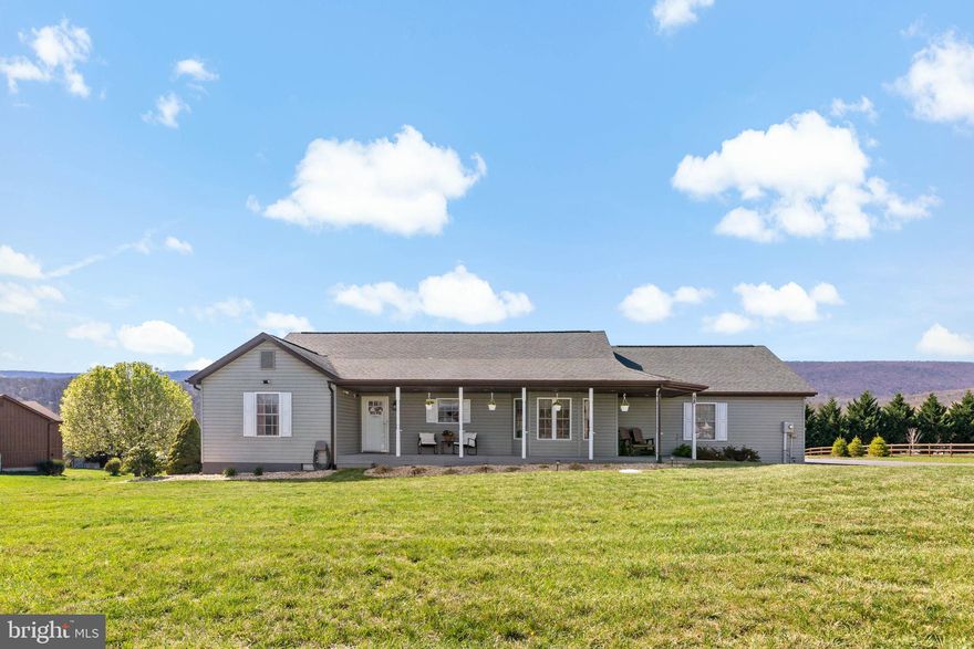 Welcome to 58 Dawson Farm Rd in Cacapon South subdivision of Berkeley Springs, WV! This well-kept 3 bed, 2 bath home offers 1,800 finished square feet and an attached 2-car garage. Sit back and enjoy the beautiful mountain views from your own backyard. Inside, you'll find a bright and open layout that’s both functional and comfortable. Located just minutes from Cacapon State Park, where you can enjoy a round of golf, explore scenic hiking trails, or spend a relaxing day by the lake. A peaceful setting with easy access to outdoor adventure—don’t miss this one!