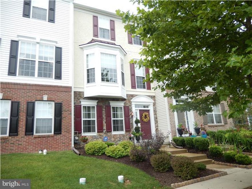 Stop the car?this is the house for your buyers!!!!!  Great community, Great location & Great Floor plan!  Truly the best location in the community?backs to open space with great views. Gorgeous hardwood floors in the dining room & kitchen with GE profile appliances, gas cooking, 42" cherry cabinets, bay window & breakfast  area.  The living room offers a beautiful gas marble fireplace and triple slider to custom built trex deck!  Master bedroom suite has tray ceiling, beautiful master bath with soaking tub, shower, double bowl vanity and separate water closet!!  2 additional bedrooms, hall bath and laundry complete this level.  Family/game room on lower level.  Spacious 2 car garage with off street parking. Recent updates include newer roof, gutters & storm door (all Oct 2014). This immaculate home is in move in condition and is tastefully decorated. Located  in the wonderful community of Windsor Ridge this gorgeous home has a spectacular club house and pool. Pride of ownership is displayed in every room!!