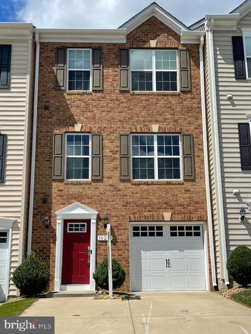 Price improvement!  Seller motivated, great location living in Lakeside.  Just minutes to Rt 1 and I 95. This Town Home is  beautifully updated  and is move in ready offering open concept of a modern kitchen, living and dining  area. Great for entertaining.  Beautiful laminated flooring throughout all three levels. This home has 3 bedrooms, 2 full bath and 2 half baths. Kitchen offers  stainless appliances, eat at kitchen island  with pull out drawers, pantry and granite counter tops.  Sliding glass doors  open to the composite deck for your family grilling pleasure.  Modern light fixtures throughout with 2 new ceiling fans in the bedrooms.  Master offers Vaulted ceiling and private bath. and walk-in closet.  Fully finished basement for your family's  entertainment room,  or office space, walk out into the fenced backyard. NEW HVAC system. NEW washing machine.  1 car garage and 2 car parking driveway.