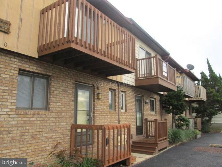 2 Bedroom Town House *** NO CONDO FEES****in process of being UPDATED. New Kitchen, New Tile Down Stairs Floors. New Carpet upstairs...Back Porch over looking empty lot. North Ocean City Location Caine Woods.