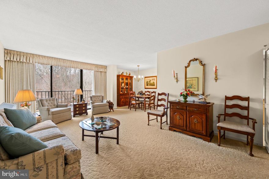 Awash in natural light and offering picturesque views of Crum Creek and the surrounding woods, this beautifully maintained 2-bedroom, 2-bath condo provides exceptional living in a vibrant and highly regarded community. Located in the renowned Strath Haven Condominiums, recognized as a “Gold Star Community” by the Community Associations Institute, this unit combines comfort, convenience, and a superior quality of life. Conveniently situated near Swarthmore's charming town center, the property offers easy access to Swarthmore College, the Scott Arboretum, local shops, and the regional train station. Facing southwest, this spacious condo is bathed in natural light throughout the day. The open and airy living room features a sliding glass door that provides seamless access to the balcony. The generous balcony is perfect for enjoying morning coffee, an afternoon drink, or a stunning sunset. Large enough to accommodate a café table and chairs, the balcony serves as an inviting extension of the living space. Adjacent to the living room is a dedicated dining area, ideal for entertaining or everyday meals, located just steps from the functional galley kitchen. The kitchen is thoughtfully designed with ample cabinet space to keep everything organized. The spacious primary bedroom offers plenty of room for your furnishings and features two large closets with abundant storage. An en suite bathroom with a convenient stall shower adds privacy and ease. The second bedroom is equally well-sized, with a large closet and direct access to the hall bathroom, which includes classic tile flooring and a bathtub/shower combination. A laundry closet with a stackable washer and dryer, plus additional shelving, adds practical convenience. This unit also comes with a coveted storage unit conveniently located across the hall. While these storage units can occasionally be sold between residents, they seldom change hands. This award winning condo association offers a host of amenities designed to enhance your lifestyle. Enjoy access to an outdoor pool with changing rooms, a free lending library, a hobby workshop, a meeting room, a card and a game room. The community also hosts a variety of book and social clubs, engaging events, and a complimentary van service for shopping trips to nearby areas, as well as occasional excursions to Booth’s Corner Market, H Mart, and other specialty destinations. The monthly condo fee is the most comprehensive in the area and includes electricity, gas, water, sewer, heating, and air conditioning. The special assessment of $12,247 for 2025 is fully paid and the new owner will not need to pay the special assessment for 2025.