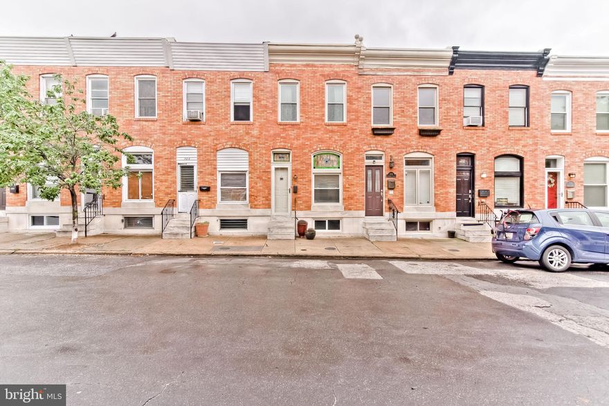 Beautifully restored Canton rowhome with chic updates throughout! Stainless steel appliances, Butcher Block counters, Exposed Brick, Hardwoods everywhere with a newly finished basement/bedroom option. The Parking pad gives peace of mind, so you don't have to worry about what time you come home. Great location in the heart of Canton. Full size washer and dryer. Central air and heat. Don't miss this one!