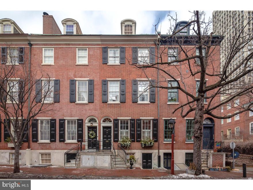 Beautiful, classic, light-filled Society Hill home w fabulous inside and outside space. It features 4 bedrooms, 3.5 baths, a landscaped garden,two Pennsylvania Blue Marble fps,gorgeous random width pine fls and an elegant staircase with lovely landings. The home has been extensively remodeled including an entirely new kitchen w custom cabinetry,new baths,new landscaping. The entry foyer with a coat closet leads to an open living/dining area w fp and a large window wall overlooking the grdn. The exquisite staircase opens to a landing w space for a desk/sitting area and has a large window viewing the grdn. The 2nd fl boasts a luxurious MBR suite w fp, an ultra bath w walk-in shower, tub, and make-up vanity.It also includes a sitting(TV)room with a walk-in closet. The next landing has a laundry rm with w/d and ample shelving. The 3rd fl offers a spacious 2nd bdrm and a nicely sized 3rd bdrm(currently used as an office),in the hallway there is a large closet and a deluxe bath w walk-in shower,tub, and double sink vanity.Just off the hallway is another bath w a stall shower.The  4th fl is a huge dormer room ( 4th bdrm, au pair suite,den,etc)with a refrigerator/bar. The lower level has a pwdrm on the landing leading to the full,cement basement.Plus there is 2 zoned heat/ac in this truly wonderful home conveniently located within easy access to the amenities of city living.Walk Score 94!