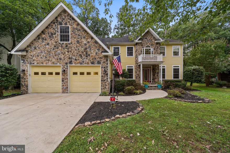 Stunning stone front colonial in sought after Swan Point. Situated on a large wooded lot featuring 5 bedrooms and 4 full baths. This home has a separate formal dining room  a 2 story family room, home office an oversized 2 car garage with room off garage that could be used as a home gym.  This beautiful open floor plan has gleaming hardwoods throughout main level. The spacious chef ready kitchen features a walk-in pantry, stainless steel appliances, ample counter space , custom cabinets and two level center island. Off of the kitchen there is an eat in dining area which leads into the doors to your rear yard space. The open living space boasts floor to ceiling windows with tons of natural lighting and a cozy gas fireplace. You’ll also find a full bedroom and bathroom on the main level. Upstairs you’ll find 4 more rooms including the oversized master with spa like bathroom with huge soaker tub, over sized shower, enormous walk-in closet and tons of counter space!  Bedroom 1 upstairs  has a private full bathroom and  bedroom 2 and 3 share a full jack and jill style bathroom. This home truly has so many amazing custom updates and upgrades
Including 9 foot ceilings, dual staircases, crown molding, oversized garage with auto openers , dual heat pumps with oil back up. Come and enjoy all the amenities that swan point has to offer such as  a swimming pool, golf course and club house! This neighborhood is waiting for you to call it home!