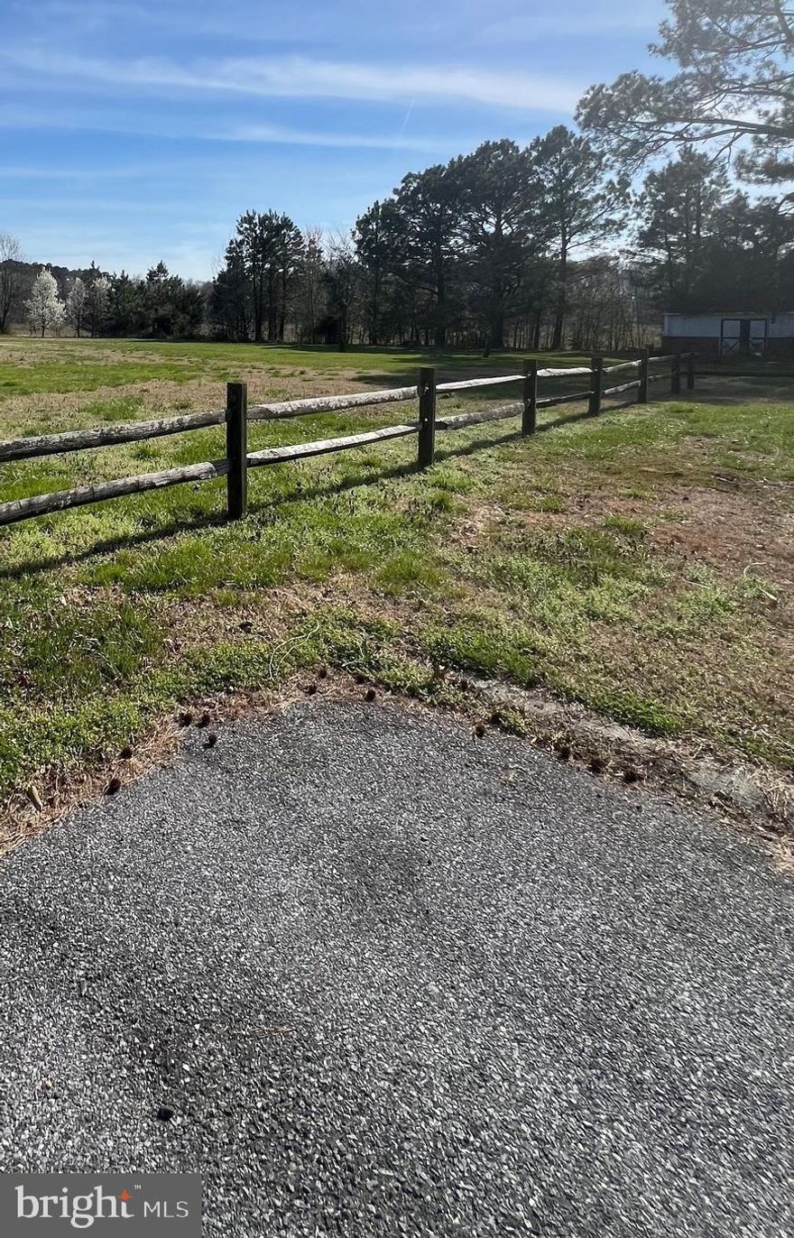 Located in a serene setting, this open parcel provides plenty of room to design and build to suit your needs. An added bonus is the option to acquire two neighboring lots, offering additional potential for growth or investment. The tranquil surroundings create an ideal backdrop for your future home or getaway. With so many possibilities, this property is ready for your vision. 

Buyers and agents should verify all information and conduct their own due diligence.