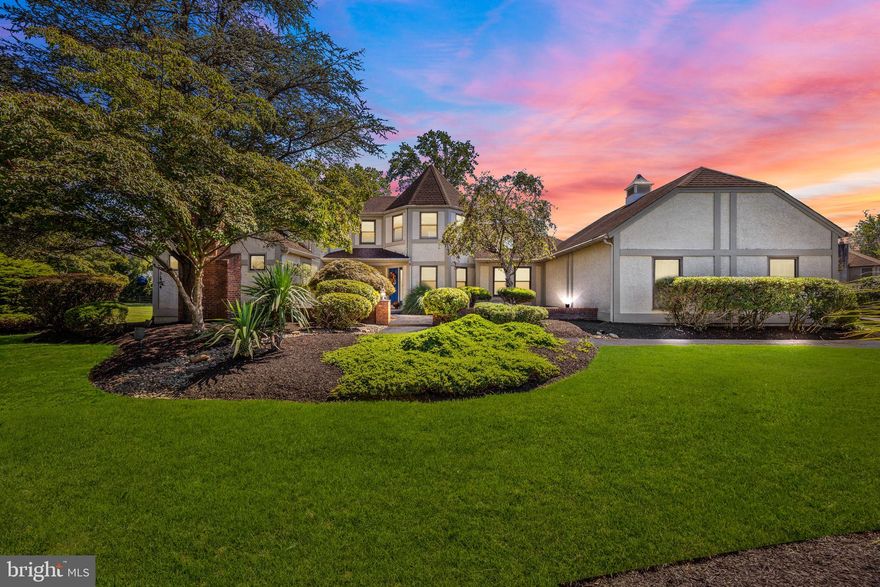 This rarely offered Manor home in Eagles Mere has been thoughtfully maintained and extensively updated over the years. Upon entry, the residence welcomes you with a striking two-story foyer featuring an elegant upper-level bridge. A key highlight of the property is the first-floor wing, which presents an impressive owner's suite complete with a spacious bedroom, comfortable sitting area, custom walk-in closet, and a remodeled bathroom showcasing a double sink granite vanity, MTI 20 jet air tub with heated air blower, and gas fireplace.
The kitchen is designed to accommodate the most discerning culinary enthusiasts, offering custom wood cabinetry, ceramic tile flooring, granite countertops, dual Wolf ovens (one steam/convection), and a six-burner propane gas Wolf stove with a pop-up vent. Additional high-end appliances include a professional-grade Miele dishwasher, Sub-Zero wine refrigerator, Sub-Zero refrigerator and a seating bar area with a mounted TV overlooking the family room.  The family room is accentuated by a cathedral ceiling with skylights, a propane gas fireplace, a large wall-mounted TV, and sliding doors leading to a Trex deck. The living room provides access to the front courtyard and a decorative gas-log fireplace. The formal dining room also offers direct access to the Trex deck through sliding doors.
The upper level includes three generously sized bedrooms, each appointed with newer neutral carpeting, walk-in closets, and ceiling fans. One bedroom is enhanced by a double-door entry and a renovated en-suite bath with Carrera marble flooring and a quartz countertop, while the remaining two bedrooms are served by a remodeled hall bath featuring a quartz double-sink vanity and a stall shower with a custom glass door.
A spacious, impeccably clean unfinished basement offers a dedicated wine cellar highlighted by a stone entry with a custom crafted wooden door. Additional features of this exceptional property include a three-car garage,  a security system ( contract ended 2025 ) & lawn irrigation system which has been in used yearly but was not activated  for the 2025 season,  two new water heaters (2024), dual-zoned heat pumps with oil backup for the main floor, mostly replaced windows, refinished oak flooring, and fully renovated bathrooms and kitchen - All on an expansive, professionally landscaped lot. Don't miss out on this stunning home rarely offered in prestigious Eagles Mere!