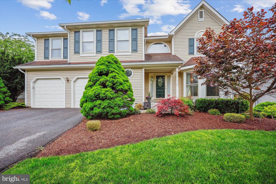 Welcome to this spectacular contemporary model by Miller & Smith—boldly EXPANDED and UPGRADED  into the LARGEST HOME in the highly desirable Stonebridge community! With 4 BR, 3.5 BA, 2 gas fireplaces, and over 5,500 SF of living space, this one-of-a-kind home has been thoughtfully re-designed, expanded, and meticulously upgraded with fine finishes throughout. Major highlights include an enormous main-level primary suite addition built in 2004 with a spa-like owner’s bath, a sitting room/office, an large open-concept gourmet kitchen, an upper-level loft, and a walkout basement!

Enter through the beautiful front yard featuring an American Redbud tree and flagstone walkway leading into the welcoming Foyer, with the formal Dining Room bathed in natural light from a large bay window and displaying crown and chair rail molding, recessed lighting, and hardwood floors. Step into the expanded KITCHEN and breakfast room— a true SHOWSTOPPER with VAULTED CEILINGS, a skylight, granite countertops, a center island with prep sink, cherry cabinetry, built-in wine rack, and premium stainless steel appliances—including GE double wall ovens, a Thermador gas range, Bosch dishwasher, and a cherry-paneled GE Monogram refrigerator.   An arched window above the deep sink opens to the adjacent Family Room, creating a light and airy flow between the two spaces.   A newly designed side Hallway off the Kitchen includes a Powder Room, adding both style and convenience.   The Family Room addition provides a cozy yet elegant retreat, with ​Cathedral ceilings, recessed lighting, hardwood floors, double-pane French doors and windows, and a gas fireplace. This inviting space opens onto a private rear deck, with stairs leading to an expansive patio and lush backyard below.

A true sanctuary, the MAIN-LEVEL PRIMARY SUITE, is redesigned to offer luxurious comfort with brand NEW CARPETS, CATHEDRAL CEILINGS, large Palladian-style windows, French doors to a private Office or Sitting Room, and dual walk-in closets. The spa-inspired En-Suite Bath features a granite double vanity, makeup dressing table, oversized walk-in shower with built-in bench and niche, private toilet room, double-door linen closet, and architectural accents such as a skylight and half-moon window that flood the space with natural light.

Framed by gleaming wood floors and dual closets, a stylish and practical Mudroom and Laundry area—formerly a powder room—is adjacent to the ​Garage. This utility space features a charming front-facing window, built-in storage bench and cabinets, front-loading WiFi-enabled LG washer and dryer, and utility sink.

Upstairs​ with brand NEW CARPETS, two spacious Bedrooms (one with an extra storage closet) share a hall bath, while an OPEN LOFT—overlooking the living area below—includes custom built-in bookshelves, cabinetry, and dual desks. This versatile space can easily be enclosed to create a​ 5th bedroom, if desired. 
 
The finished walkout lower level offers even more living space and versatility, highlighted by a large Recreation  Room with a 2nd gas fireplace flanked by signature half-moon windows. A convenient Kitchenette with a mini fridge, sink, and cabinetry makes entertaining effortless. A Bonus Room or ​2​nd Office includes 3 double-door closets with built-ins, while the ​4​th Bedroom features cedar-lined closets and large windows overlooking the backyard. The full Bath includes a walk-in shower and a second shower space designed for a Steam Room. Step outside to a beautifully hardscaped covered Patio with outdoor ceiling fans and lush, private yard—ideal for relaxing or entertaining.​   Two ​HVAC units serve the main structure and rear addition separately. 

Enjoy  the community amenities of club house/pool/tennis ct/tot lots/trails. Within close proximity to great shops/restaurants & major roadways (I-270, I-370 & ICC),   this ​t​rue gem  is sure to WOW even the most discerning buyer!