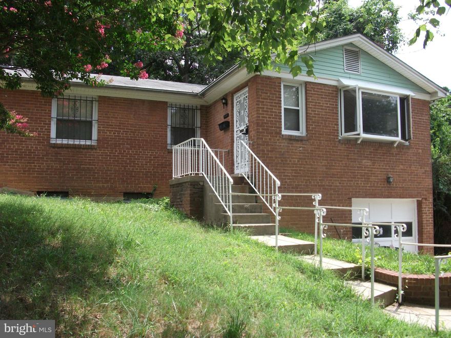This unique 3-bedroom home in the established HILLCREST HEIGHTS community of Temple Hills.  This property features 2 levels of living, Hardwood floors on the main level, brick hearth fireplace in the living room and a one car garage. This property is just waiting for your special touches to bring it to life.