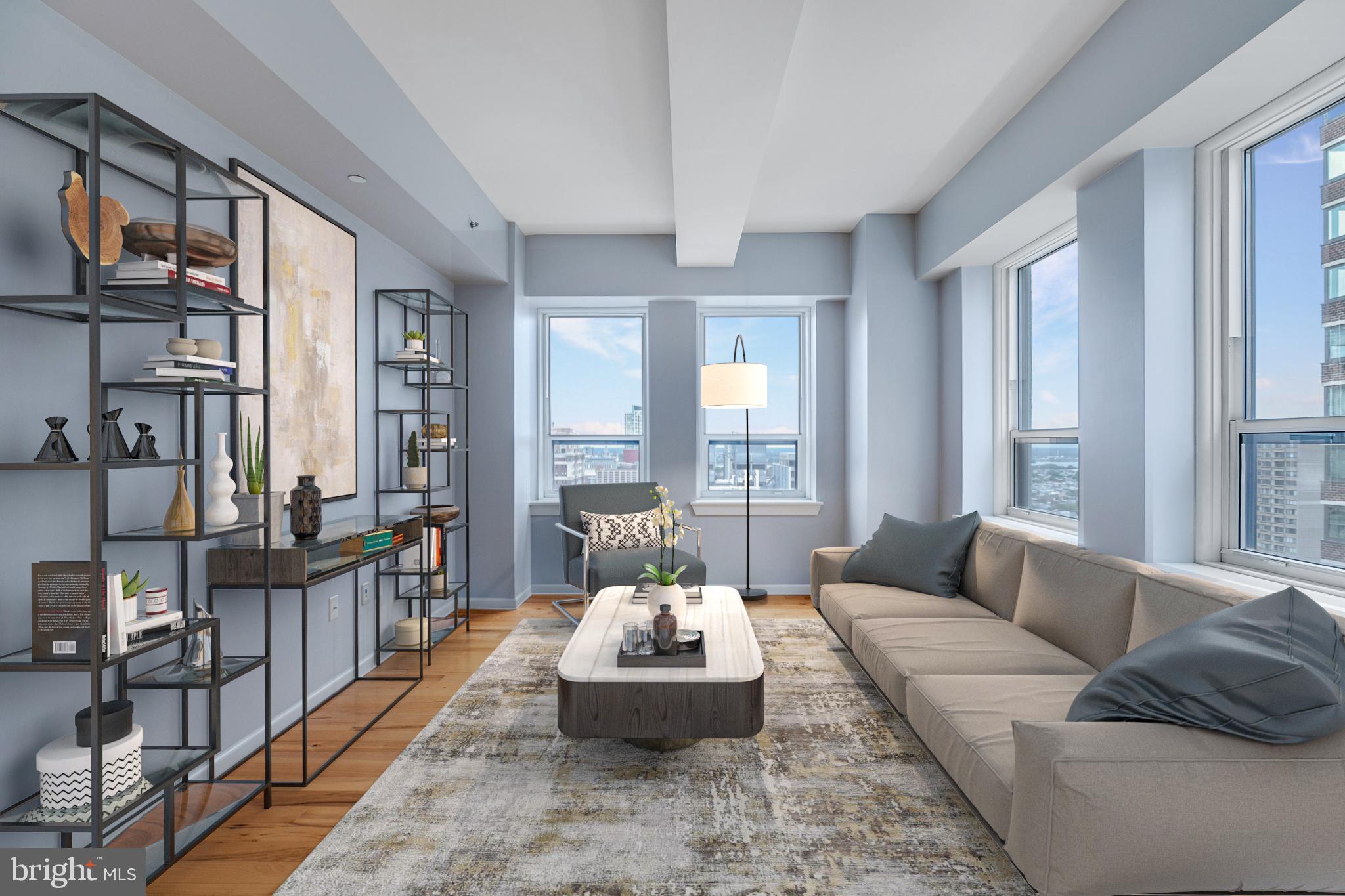 Located in the heart of Center City, this beautifully appointed two bedroom, two full bathroom residence provides 1,258 square feet of living space. Large windows accentuate 180-degree city views and high ceilings add to the home's light and airy feel. A combined living/dining room is your personal oasis from the hustle and bustle of city life and also allows for plenty of open space for entertaining friends and family. The gourmet kitchen has modern cabinetry, stainless steel appliances (gas cooking!!!), and granite counter-tops. The large primary bedroom includes a walk-in closet with ensuite spa style bathroom. The 2nd bedroom and full hallway bathroom sit on the far side of the home, allowing all residents maximum privacy. Additional in-home features include: a washer and dryer, individually controlled central air and heating, and ample closet space. Also included is a lower level storage unit. Resident amenities: a professional quality fitness center, owner's lounge, guest suite, a meeting and conference center, 24-hr concierge service, pet spa, and dog walk area. Enjoy easy access to Center City and beyond via convenient access to highways, nearby subway and trolley stations, regional rail, and multiple bus routes. Neighborhood amenities include The Kimmel Center, The Academy of Music, fabulous shopping, world-renowned restaurants, a plethora of exercise options, and Rittenhouse Square Park.