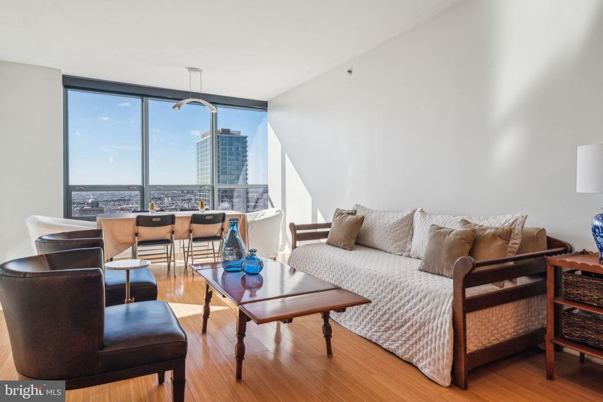 Enjoy breathtaking panoramic skyline views from this pristine one-bedroom residence with GARAGE PARKING and a BALCONY in the sky.  Close to UPENN/Drexel campuses and HUP/CHOP hospitals. Trader Joe's is right next door and Giant is just around the corner.