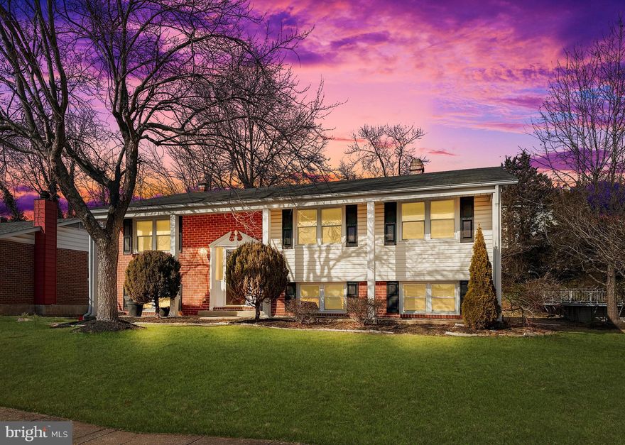 Experience the perfect blend of serenity and modern luxury in this stunning home, nestled on a tranquil street. Designed for relaxation and entertainment, this spacious retreat offers off-street parking, a picturesque neighborhood for peaceful strolls, and a backyard that’s perfect for hosting or unwinding under the stars. The main level is an entertainer’s dream, featuring an open-concept living area with gleaming hardwood floors and a 12-foot peninsula kitchen equipped with state-of-the-art stainless steel appliances, granite countertops, and a custom ceiling-mounted range hood. Crown molding, wainscoting, recessed lighting, and a large bay window add sophistication and natural light throughout. The luxurious primary suite includes a 12-foot closet and a spa-inspired en-suite bathroom with a dual-showerhead walk-in shower. Unwind in the hallway bathroom's deep jacuzzi tub after a long day. The lower level offers a spacious family room with a custom entertainment wall, including a fireplace and illuminated built-in niches, plus a wet bar that’s perfect for gatherings. Two additional bedrooms and a full bathroom provide versatility, while the walkout leads to a private backyard oasis. Very large laundry & utility room also located on lower level. Ideally located just minutes from major highways, Baltimore, Towson, White Marsh, and retail centers, this home combines elegance, convenience, and a lifestyle of relaxation. Don’t miss your chance—schedule your showing today!