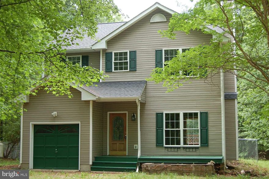 Privacy in Southern Stafford. Newly updated. Kitchen has brand new stainless steel appliances, granite, and backsplash. Laminate hardwood flooring throughout. Upstairs laundry room with brand new washer and dryer for convenience. Wood burning fireplace in family room. Large deck and backyard. Very close to Leeland VRE station.