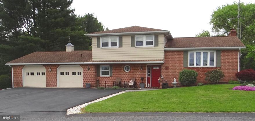 Upcoming Auction July 20th @ 10:30 .
Beautiful brick split-level home  in St Thomas Township, St Thomas PA (Tuscarora School District).
This property consists of 1.34 acres +- improved by a well-built split-level home with
2,165 square feet of living space, and a large 2-car garage. The home has 4 bedrooms,
2 full baths, kitchen, dining room, living room, office, lower-level den, and lower-level
storage/utility room. In addition, a beautiful well-lit sun room is added to the rear of the
home, which opens onto a composite backyard deck. Hardwood and Tile floors are
throughout the home. Heat is a combination of electric ceiling cable, electric
baseboard, and two mini-splits. Mini-splits also provide AC, along with two supplemental
window AC units. Bear Valley water and St Thomas sewer connections are present,
along with an onsite well feeding outside faucets. The well has extended casing/pit less
adapter for easy well pump removal.
The beautiful backyard has mature landscaping, paver and stone picnic area and
walkways, goldfish pond, pergola swing, garden area, deck and a storage barn.
This is a beautiful well-maintained property with many recent updates! Don’t miss it!