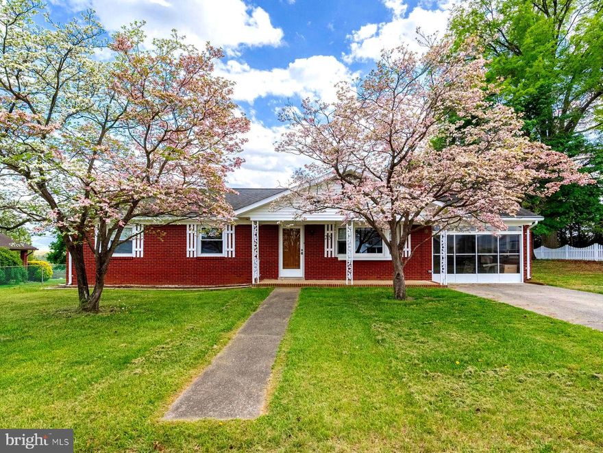 Perched at the top of a quiet, no-through street, this well-maintained brick rancher offers privacy, space, and scenic views overlooking the Town of Luray and the surrounding valley. Situated on approximately 0.36 acres, this 4-bedroom, 2.5-bath home features 2,800+ finished square feet and no HOA—an exceptional value for the space and location. Inside, you will find comfortable, functional living areas with central A/C, electric baseboard heat, and two indoor fireplaces that add warmth and character. The layout flows easily from the kitchen into the main living spaces, making it ideal for both everyday living and entertaining. The finished basement provides significant additional living space, including a bathroom and ample storage—perfect for a rec room, home office, or guest setup. Two sump pumps offer added peace of mind. Outdoor features include a spacious yard, storage shed, and even a classic outdoor fireplace—ideal for enjoying the peaceful setting and mountain views. Recent updates such as pressure washing, freshly painted fascia, and interior touch-ups make this home move-in ready. Located just minutes from downtown Luray’s shops, restaurants, and attractions, with public water, sewer, and trash service—this is a great opportunity to own a spacious home in a desirable setting at an attractive price.