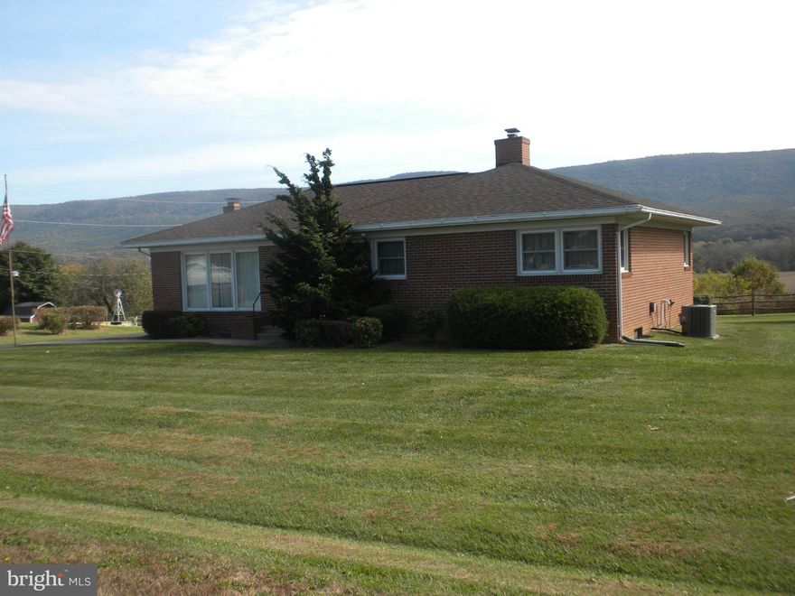 Classic Brick Rancher. Well maintained one owner home on 0.6+/- acre (total of 3 tax map tracts). Hardwood floors under carpet on main level. Beautiful mountain views. Established community with easy access to shopping, medical office, banks & interstate. Full basement with wood stove. Home Warranty with acceptable offer.