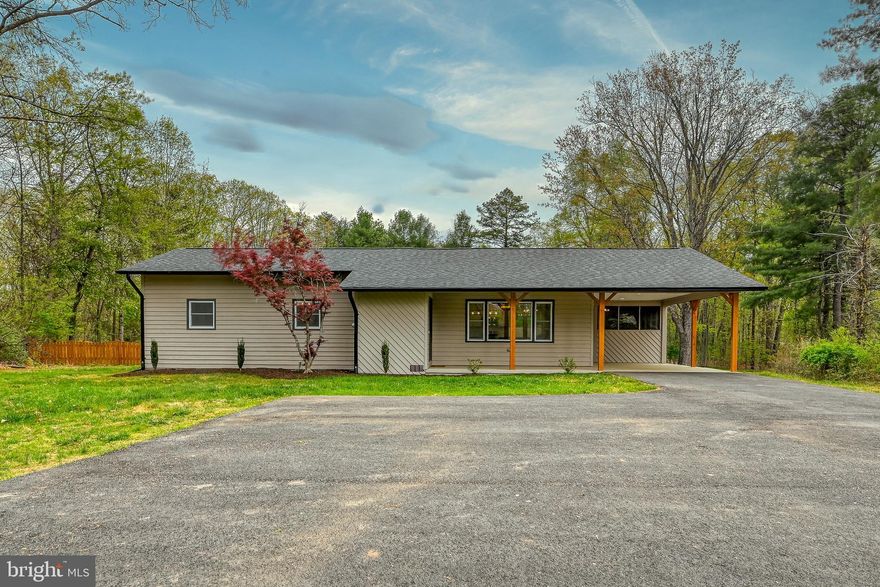 Set on 2 beautiful acres in Fluvanna County right outside of the Lake Monticello community, this beautifully remodeled home offers the perfect blend of modern style and peaceful country living. With approximately 2,000 square feet of finished space, every detail has been thoughtfully updated to create a move-in ready retreat. The main level features a bright, open-concept layout with 3 spacious bedrooms and 2 full bathrooms. The stunning kitchen is the heart of the home, showcasing crisp white cabinetry, sleek quartz countertops, large kitchen island, and plenty of space for cooking and entertaining! The adjoining living area is warm and inviting, highlighted by a modern fireplace with a stylish shiplap surround. Both full bathrooms on the main level boast beautiful tile work and durable luxury vinyl plank flooring, combining elegance with everyday functionality. Downstairs, the finished basement expands your living space with a large recreation room, bonus room, and an additional full bathroom ideal for guests, a home office, or multi-generational living. Step outside and enjoy everything this property has to offer.  Relax on the covered concrete front porch, unwind in the screened-in porch, or entertain on the back deck overlooking the expansive backyard. Additional features include a paved driveway, attached carport, whole house generator, and a large Garage/Workshop with electricity perfect for hobbies or extra storage. And to top it all off, this home includes your own private oasis with a sparkling in-ground swimming pool, just in time for summer season!

This property truly has it all! Space, style, and the tranquility of country living with modern comforts.

All of this is conveniently located just a short drive to Zion Crossroads and Charlottesville, offering easy access to shopping, dining, and everyday conveniences while still enjoying the privacy and charm of country living