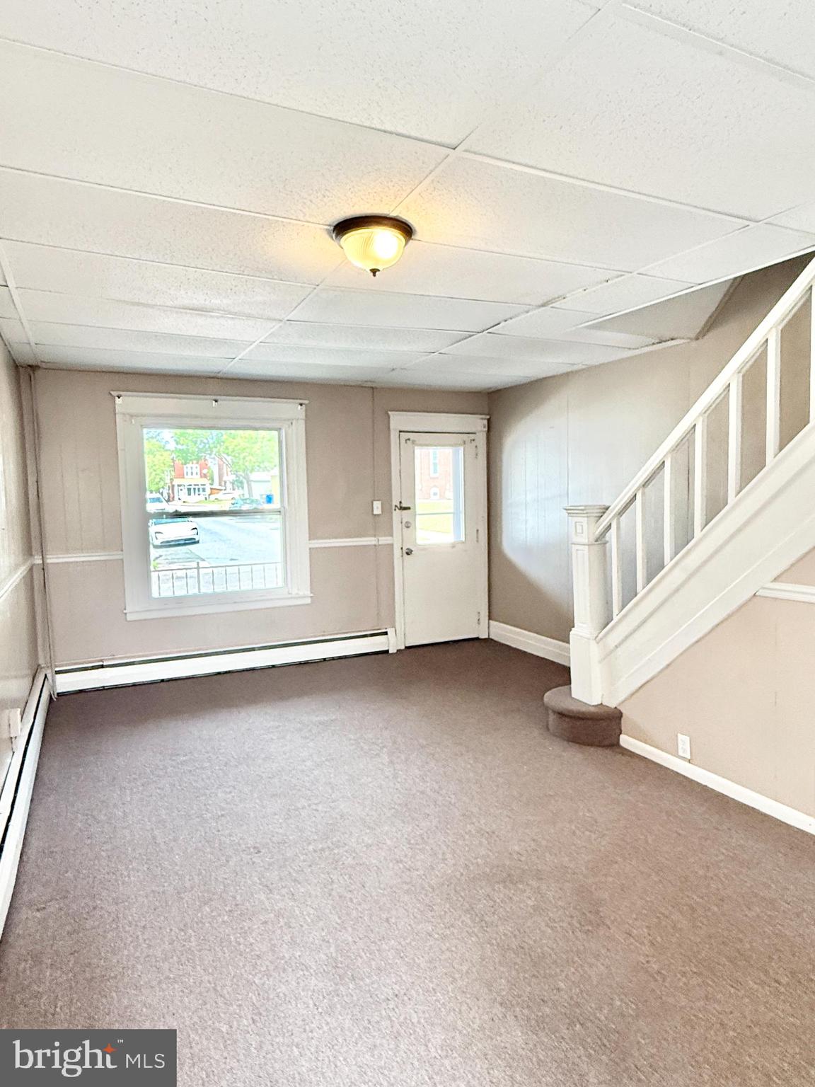 This charming 3-bedroom, 1-bathroom townhouse, offers a warm and inviting atmosphere perfect for creating lasting memories. The traditional floor plan features a cozy breakfast area and a kitchen equipped with essential appliances, including an electric oven/range, refrigerator and in-unit washer for your convenience. Enjoy the spacious unfinished basement, ideal for storage. With on-street parking, accessibility is a breeze. Located in a vibrant community, you'll appreciate the nearby parks for outdoor activities. Available for lease starting August 1, 2025, with flexible terms ranging from 12 to 24 months, this home is ready to embrace its next residents. Experience the comfort and charm of this delightful property, where every corner feels like home.