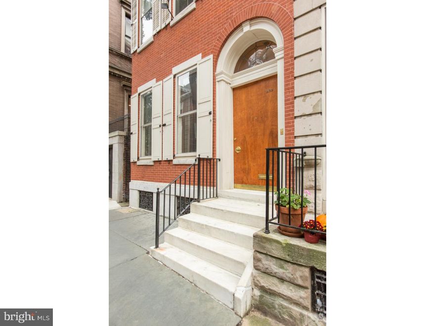 This Classic Delancey Street townhome sits on one of the most desirable and historic streets in the Rittenhouse Square area of Philadelphia.  Windows on the north, east, and south sides of the home flood the interior with light, making it unusually bright and pleasant for a center city townhouse. You enter into a foyer and hallway from which a welcoming den with 11 foot ceilings greets you.  Beyond that is a bright and spacious dining room, kitchen, and breakfast room.  The second floor is a full living room large enough for a grand piano, and also made bright by three huge windows.  Beyond is a small library.  There is also a back staircase leading down to the kitchen below and helpful for servicing large parties.  Half a flight up is the Master Bedroom with a walk-in closet and bathroom.  Another half flight leads to two additional bedrooms and baths.  A skylit staircase goes up to a bedroom suite with two windows, two large closets, a bathroom and its own outdoor deck. The home has hardwood floors throughout, though those on the upper levels are currently covered by carpeting.  A sizable finished basement can serve as a playroom or TV room.  Outside of the rear of the home is an area which could be turned into a small garden, and a walkway which could easily accommodate an elevator to all floors.   Owner will provide a 1 year Home Warranty.
