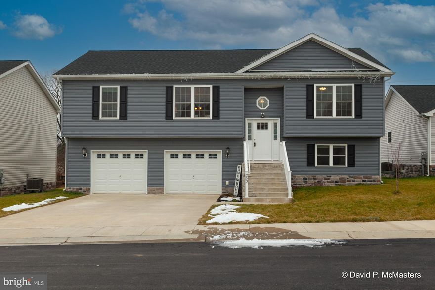 MOTIVATED SELLER - BRING ALL OFFERS! This one is not like the others! Nearly new construction in desirable Red Hill featuring 4 spacious bedrooms and 3 full baths, large 12x24' rear screened porch, composite rear deck w/stairs too the privacy-fenced rear yard. Swing set and trampoline can stay if you'd like them! Built in 2021, this home shows beautifully and is wonderful for entertaining. From the two story foyer you head upstairs to the generously sized great room with open concept floor plan. Enjoy relaxing on the screened porch after work. All main living areas upstairs feature luxury vinyl plank flooring. The tree upstairs bedrooms are carpeted and the Great room and primary suite have ceiling fans. There are also two large walk-in closets in the primary suite with an attached bath w/double sinks, soaking tub and separate shower. The tastefully designed kitchen features a center island with breakfast bar, granite counters, under cabinet lighting, stainless appliances and a nicely sized pantry. The lower level features a carpeted 4th bedroom with an attached full bath of it's own, the laundry room is unfinished with a front load washer and dryer that convey. This level provides interior garage access as well. Please read the directions as the street sign incorrectly states "Dr". instead of "Ct." - we are in process of getting this corrected. And please do not use Apple Maps - they pinned the incorrect location but Waze and Google work great! Coming in on Orpington is your best and easiest route. Must have an appointment to tour.