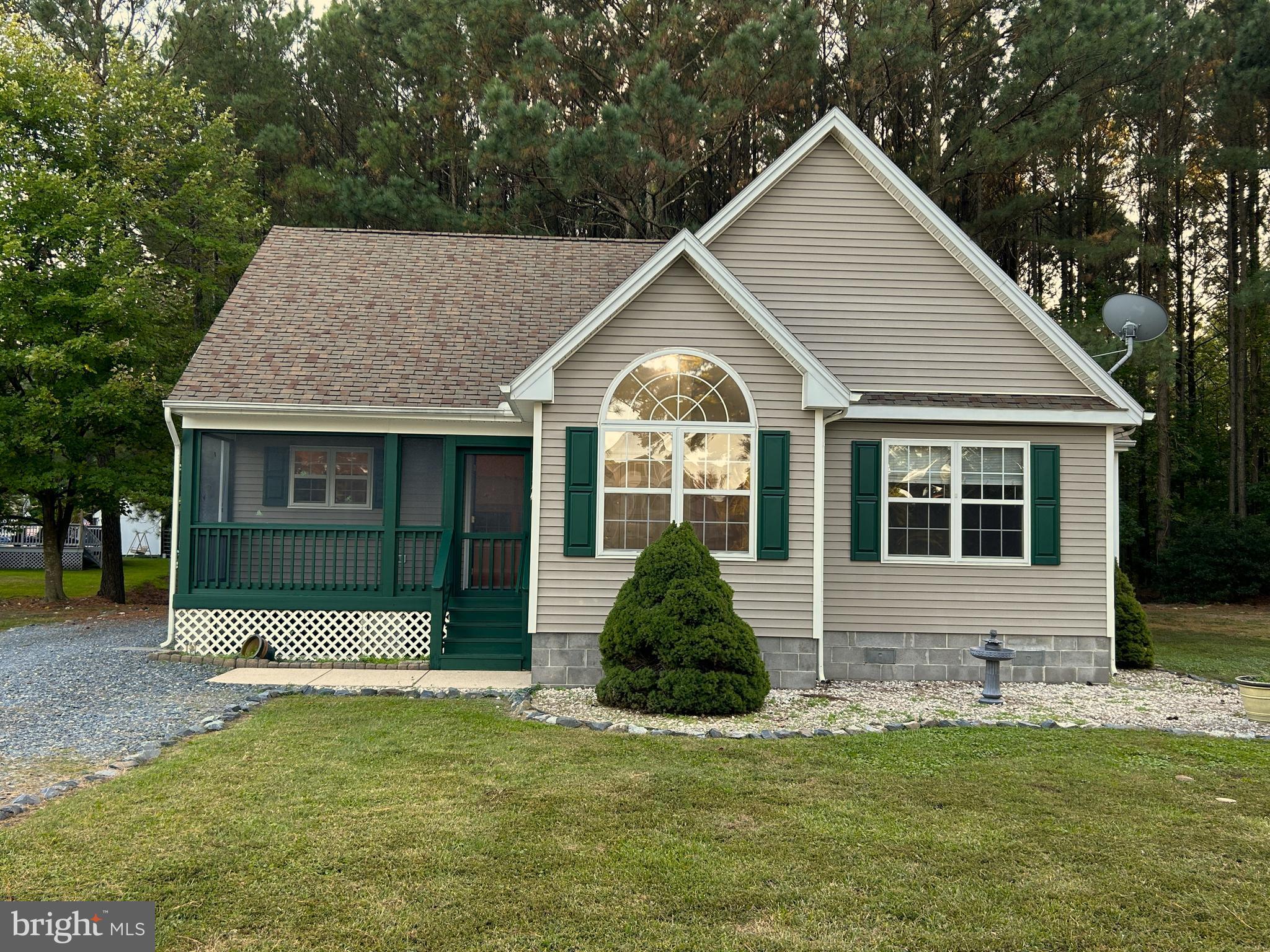 Take a look at this well maintained 3 bedroom, 2 bathroom, ranch style home located on a quiet cul-de-sac street in the county limits of Crisfield, MD. This home is situated on just over a half acre and backs up to trees which offers privacy. There is a nice screened in front porch great for enjoying morning coffee and evening sunsets. Inside the home, you will find cathedral ceilings in the dining and living room which makes the home feel much bigger. The kitchen is conveniently located off of the dining area. All of the appliances are electric and stay with the home. The 3 bedrooms and 2 bathrooms are located on the other side of the home. The master bedroom offers a walk in closet and its own master bathroom with a double vanity sink. This is a 2 owner home with the second owner living in the home over 20 years. The home is serviced by public water and sewer and does require flood insurance. Call today to schedule a private tour.