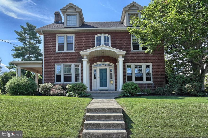 Spacious, well maintained 4 bedroom brick home in New Holland. Hardwood flooring, eat in kitchen with built in desk, wood stove & built in shelves in family room and sunroom with vaulted ceiling. Large covered side porch, rear patio and detached 2 car garage.  Updated furnace & new roof, gutters & pillars 2015.