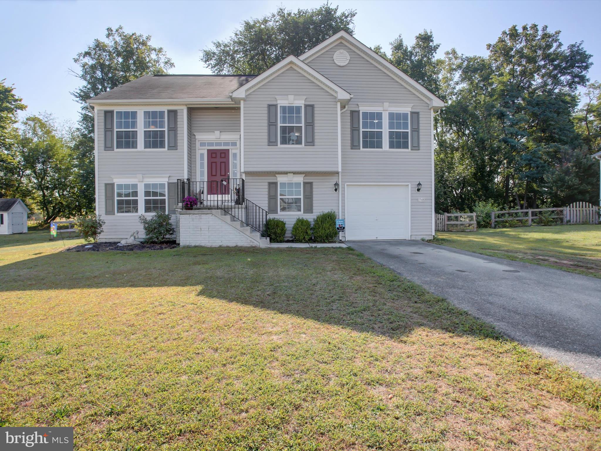 Welcome to 15480 Wedgewood Drive ! Beautiful Bi-level in a family friendly neighborhood. The upper main level of this home comes well appointed with 3 bedrooms and 2 bathrooms, a large living room and eat-in kitchen, ample closets/storage and a large deck overlooking a private and fenced rear yard. A finished bonus room on the lower level could serve as a fourth bedroom or family room. On top of all this...the possibilities are endless for unfinished part of the lower level. Rough-in plumbing exists for bathroom 3, plus ample space to create whatever your family needs. An oversized one car garage is attached allowing for storage or even a second car. Large patio off the lower level with deck overhead providing shade for relaxing and enjoying the backyard.