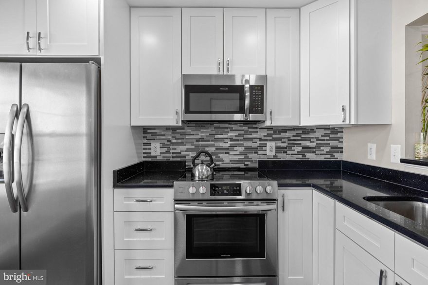 ***Offers due Tuesday at 9am*** This beautiful recently renovated bilevel townhome awaits!  Home buyers can rest easy knowing that several system upgrades were performed in 2020 - NEW Kitchen, stainless steal appliances, washer/dryer, double pane energy efficient windows and sliding glass doors (with a lifetime warranty!), new carpeting and flooring, crown molding, water heater, electrical panel, and freshly painted to boot! Not to be overlooked is the peaceful back deck ideal for entertaining friends or grilling out!

Ideally located for commuters only minutes to the metro as well as 95/495! Also situated in close proximity to downtown DC, National Harbor and Alexandria for a night on the town.  Welcome home!