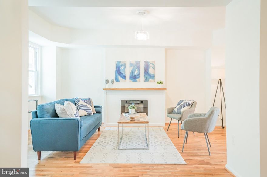 So much to say about this brilliant renovation.  4 bedrooms 2.5 bath with so much customization.  Tray ceilings on the 1st floor and in the master bedroom.  Hardwood floors throughout with 2nd floor and stairs being historic refinished hardwood.  Brand new kitchen with upgraded gold fixtures.  Crystal light fixtures throughout with large beautiful dining room chandelier.  Large master bedroom with double vanity in bathroom and walkout to 2nd floor private deck. Custom bathrooms and vanities. Stainless steel appliances are included and should be at the house next week.  Fully finished walkout basement with a huge game/family room and another bedroom! Custom fireplace that is remote operated and LED multicolored.  Large back yard with 2 car private parking.  Come see this beauty - it wont last long.